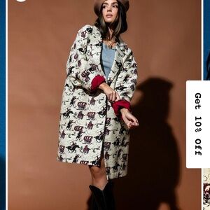 Dressed in Lala Scorpio Coat in Giddy Up